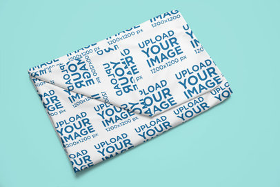 Mockup of a Folded Duvet Cover Placed on a Customizable Surface m30896