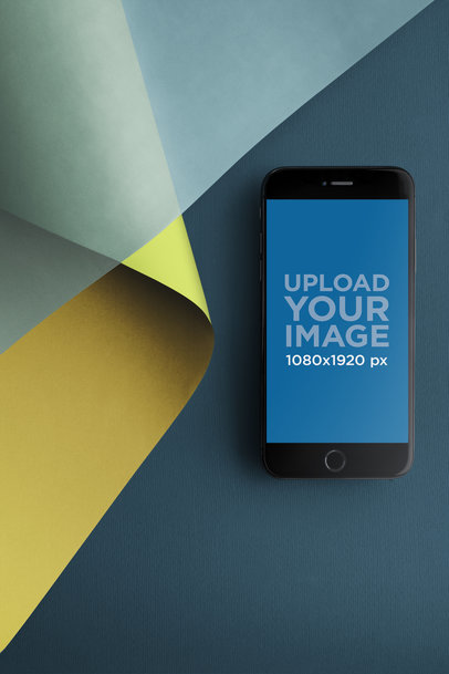 iPhone 8 Mockup Lying on a Surface Near a Transparent and an Opaque Paper