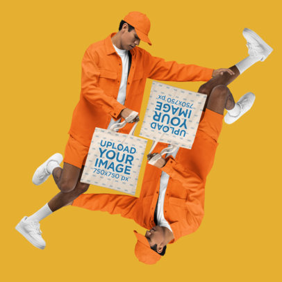 Tote Bag Mockup Featuring a Man Jumping at a Studio With a Customizable Background