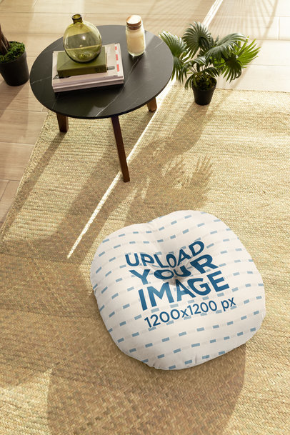 Mockup of a Floor Pillow Placed on a Jute Mat m30943
