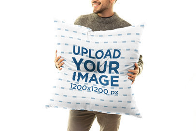Mockup of a Smiling Man Carrying a Floor Pillow