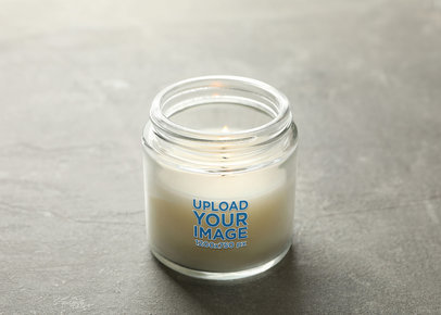 Mockup of a Candle Placed Over a Gray Surface m30427 r-el2