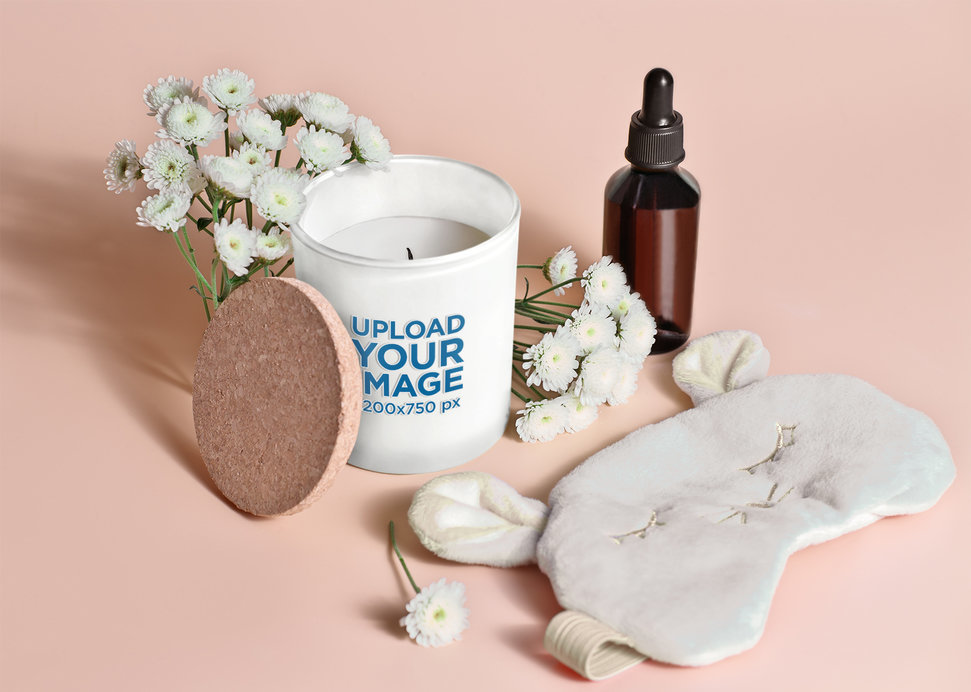Scented Candle Mockup Featuring a Decorated Setting with Flowers