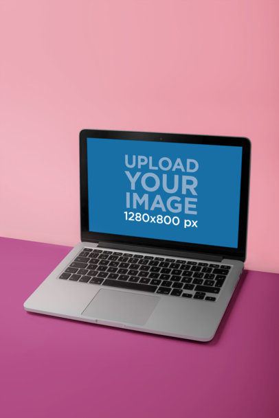 MacBook Pro Mockup Standing Against a Wall