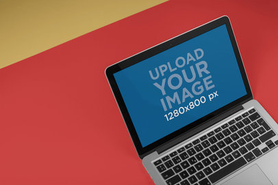 Mockup of a MacBook on a Two Colors Surface