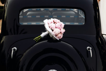 Mockup of a Windscreen Sticker Placed on a Classic Car Featuring a Wedding Bouquet m30988 r-el2