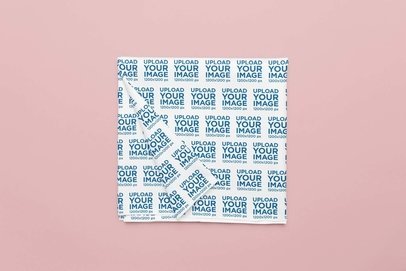 Mockup of a Sublimated Tablecloth Folded over a Solid Surface