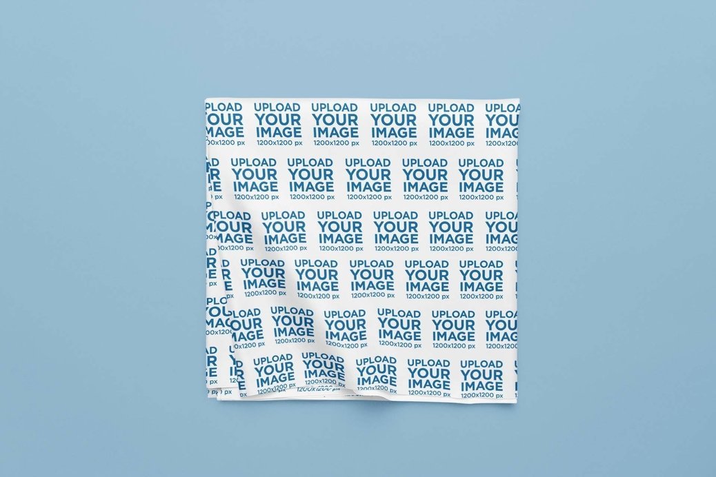Placeit - Mockup of a Sublimated Tablecloth Folded over a Color ...