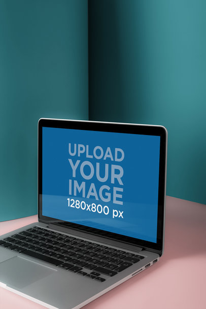 Mockup of a MacBook Standing Near the Corner of a Triple Colored Room a20337
