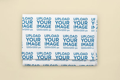 Home Decor Mockup Featuring a Duvet Cover Folded on a Solid Surface m30894