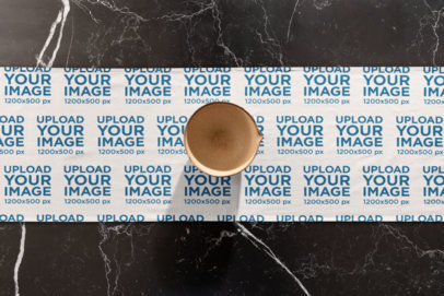 Mockup of a Table Runner Placed on a Marble Table Featuring a Vase