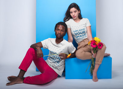 T-shirt Mockup of a Woman and a Man Posing With Flowers 