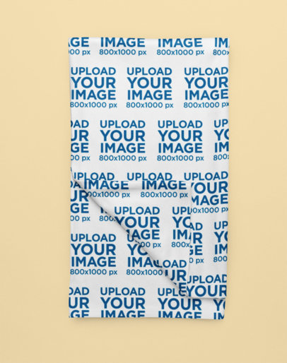 Mockup of a Folded Throw Blanket Placed Over a Customizable Background