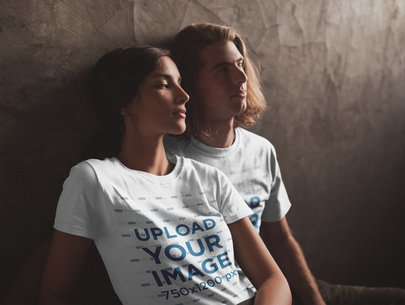 Happy Interracial Couple Wearing T-Shirts Mockup Under a Soft Light