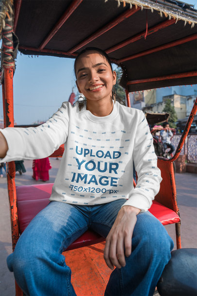 Crewneck Sweatshirt Mockup of a Happy Woman Sitting in a Carriage