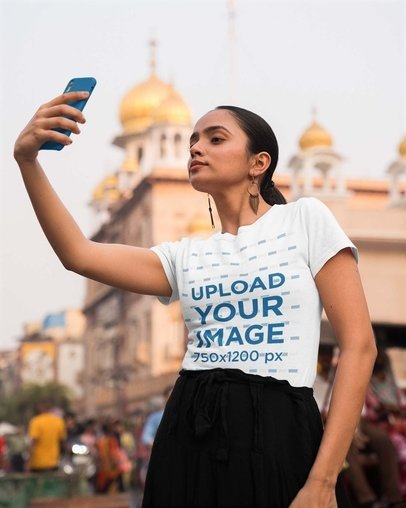 Round-Neck Gildan Tee Mockup of a Woman Taking a Selfie 
