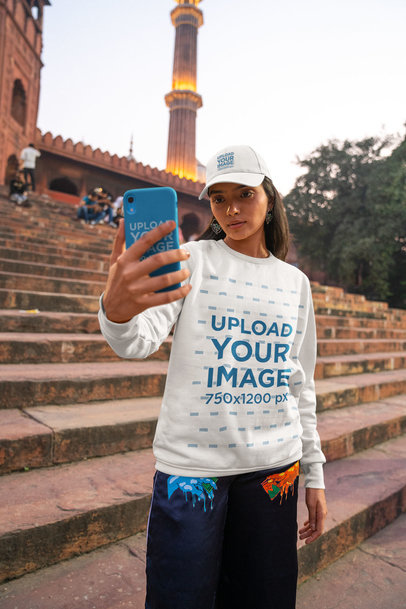 Round-Neck Sweatshirt Mockup Featuring a Woman Wearing a Dad Hat