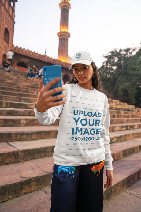 Round-Neck Sweatshirt Mockup Featuring a Woman Wearing a Dad Hat