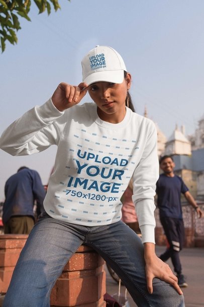 Dad Hat Mockup Featuring a Woman Wearing a Crewneck Sweatshirt