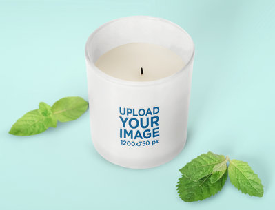 Scented Candle Mockup Featuring Mint Leaves