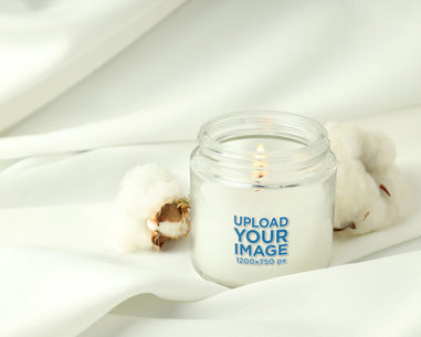 Mockup of a White Candle Placed on a Cozy Space m30434 r-el2