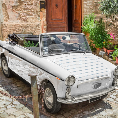 Mockup of a Decal Placed on a Convertible Classical Car's Hood 