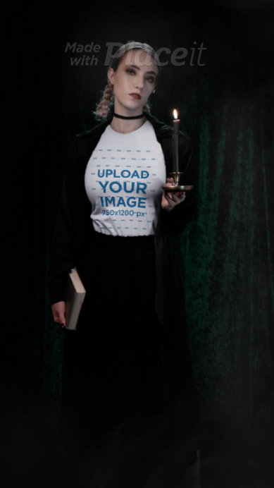 T-Shirt Video of a Woman in a Wicca Outfit Holding a Candle