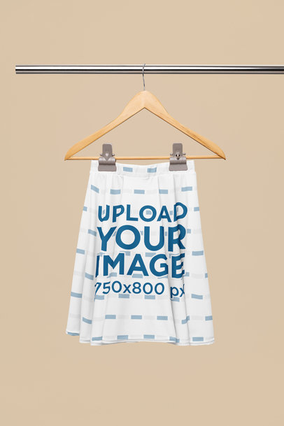 Mockup of a Sublimated Skater Skirt Placed on a Wooden Hanger m31106