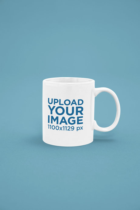 Placeit - 11 oz Coffee Mug Mockup Featuring a Customizable Backdrop