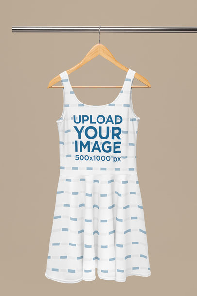 Mockup of a Sublimated Skater Dress Placed on a Wooden Hanger
