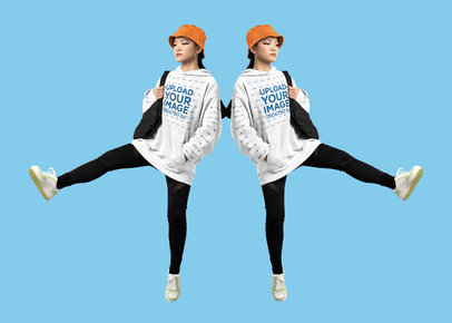 Pullover Hoodie Mockup Featuring a Mirrored Woman at a Studio