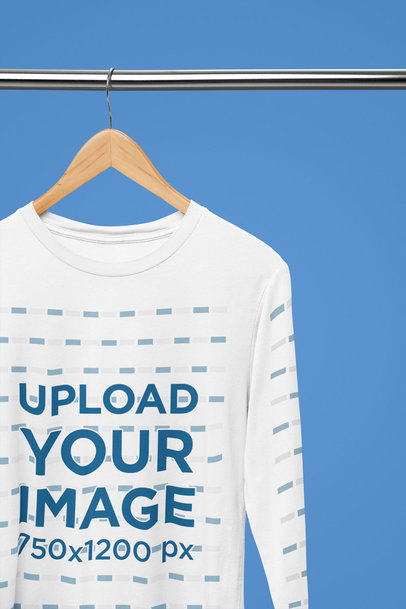 Mockup of a Long Sleeve Tee Placed on a Hanger