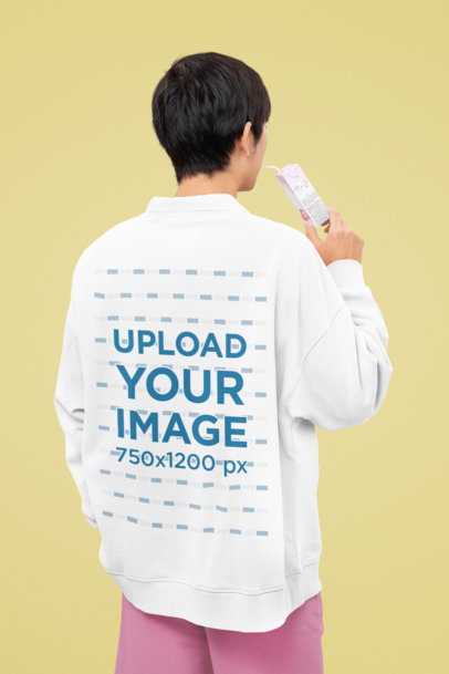 Back-View Sweatshirt Mockup Featuring a Man Drinking a Juice Box m30720