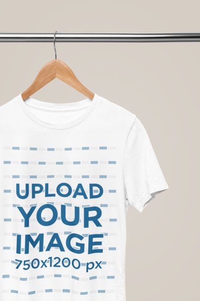 Bella Canvas Round-Neck T-Shirt Mockup Featuring a Wooden Hanger