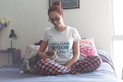 Red Haired Woman Wearing a T-Shirt Mockup Petting her Cat