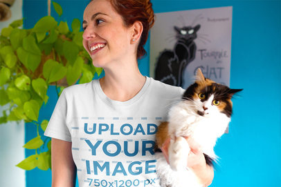 Happy Woman Wearing a Round Neck Tee Mockup Holding a Cat