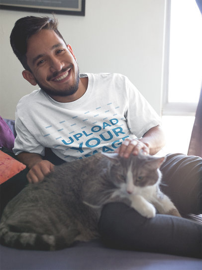 Smiling Hispanic Man Wearing a T-Shirt Mockup with his Cat