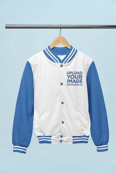 Mockup of a Bomber Jacket Placed on a Wooden Hanger
