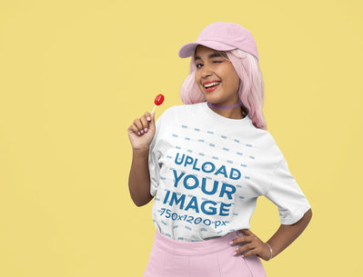 T-Shirt Mockup Featuring a Woman Winking Her Eye to the Camera
