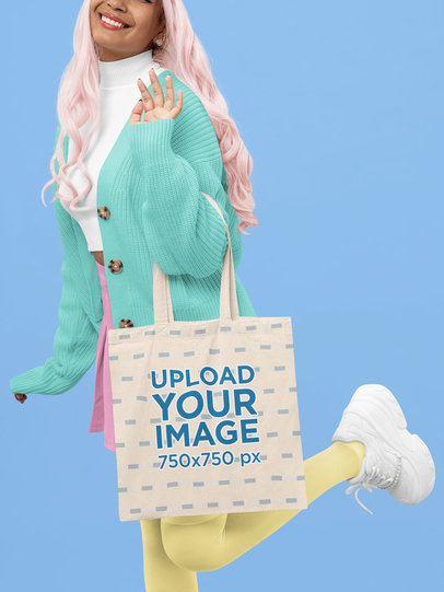 Kawaii-Themed Mockup Featuring a Happy Cropped-Face Woman Carrying a Tote Bag