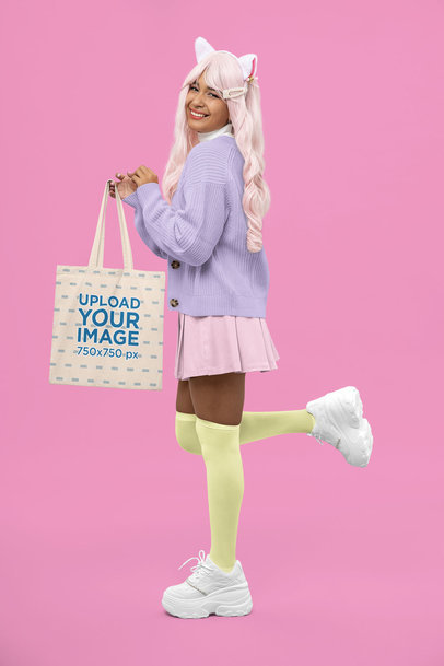 Sublimated Tote Bag Mockup Featuring a Smiling Woman With a Kawaii-Themed Outfit