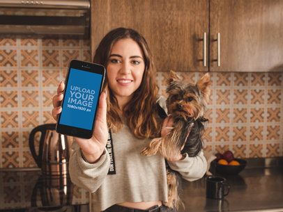 Mockup of a Girl Holding an iPhone 8 and Her Dog a19638