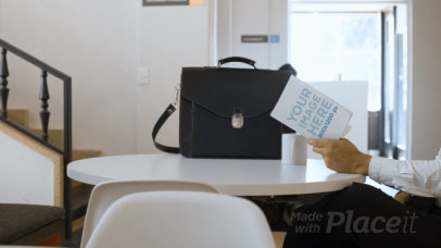 Businessman Reading a Book Video Mockup Sitting in his Living Room a14153