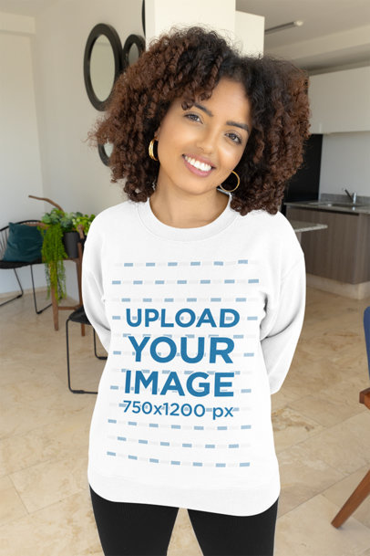 Mockup of a Woman with Curly Hair Posing at Home with a Crewneck Sweatshirt m31488