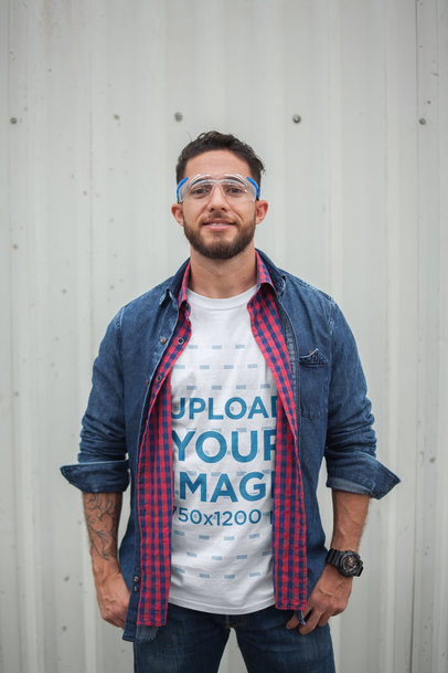 White Man Wearing a T-Shirt Mockup at the Warehouse
