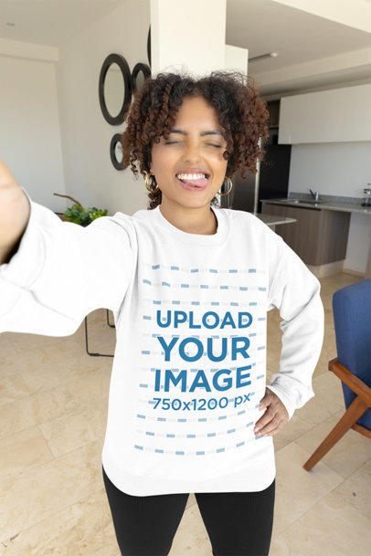 Selfie Mockup Featuring a Woman in a Sweatshirt Making a Funny Face