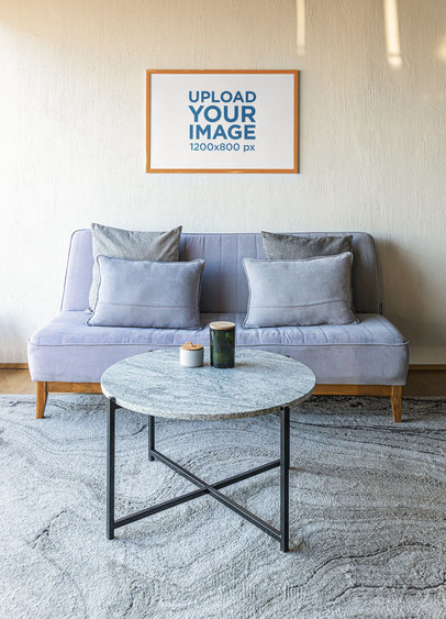 Mockup of an Art Print Placed on a Living Room Wall m31559