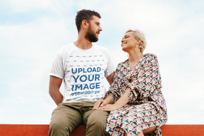 Round-Neck Tee Mockup Featuring a Beaded Man Looking Happily at His Girlfriend