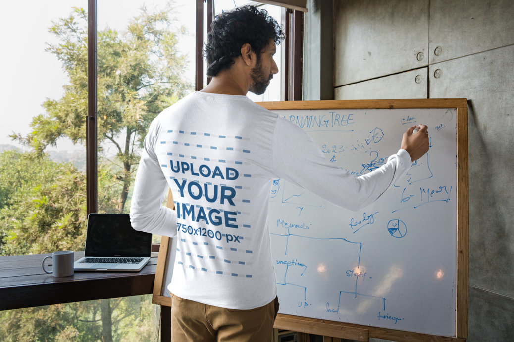 Back-View Bella Canvas Long Sleeve Tee Mockup of a Man Writing on a Whiteboard