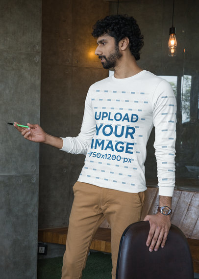 Bella Canvas Long Sleeve Tee Mockup of a Man Presenting at Work m31756